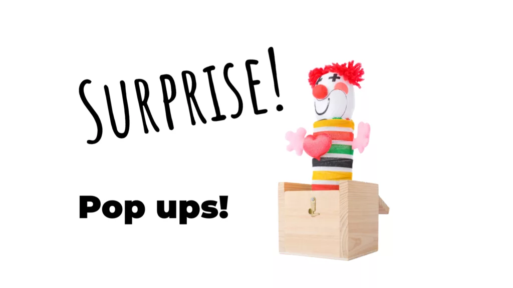 a wooden jack in the box and text reads: Surprise! Pop ups!